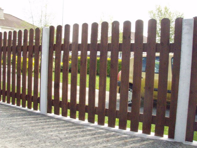 Stained Ribbed Round Top Open Picket in Concrete Posts - Lucan